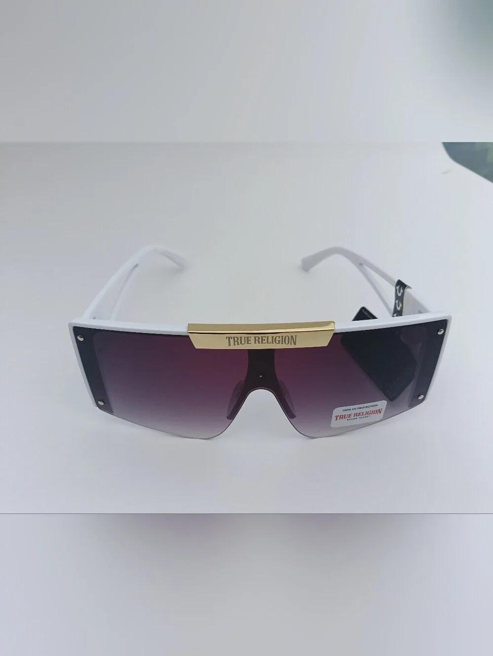 True Religion White Shield Sunglasses with Gold Accent and Purple Gradient Lens